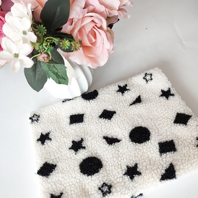 Il filato in bianco e nero del jacquard del tessuto del vello di Sherpa ha tinto per il pavimento Mats Pillow di Backoack
