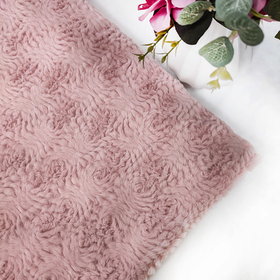 Il tessuto rosa della pelliccia del Faux del poliestere ha tricottato 58/60" per il coniglio del fiore dell'abbigliamento