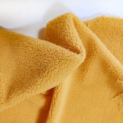 Sherpa tricottato filo di ordito tosare il jacquard giallo 100% del poliestere del tessuto per l'indumento