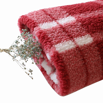 L'impianto a scacchiera ha stampato il tessuto rosso 250gsm del velluto di cotone per l'accappatoio